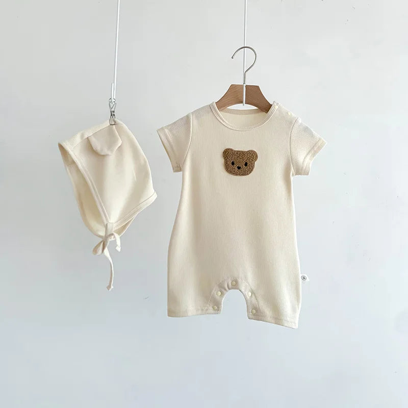 Macacão Bebê Waffle com Touca – Conforto e Estilo