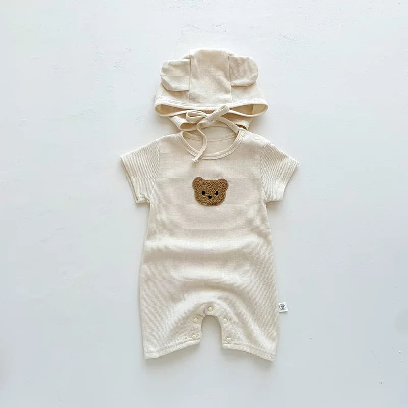 Macacão Bebê Waffle com Touca – Conforto e Estilo
