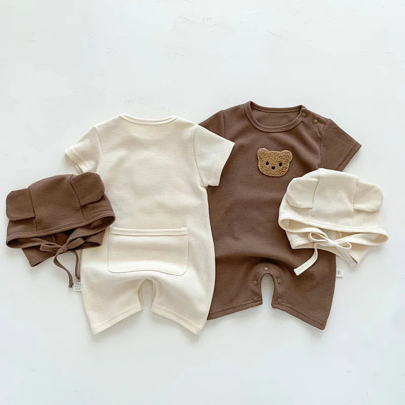 Macacão Bebê Waffle com Touca – Conforto e Estilo