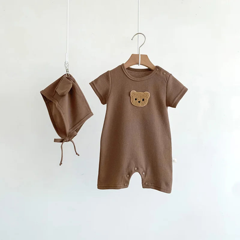 Macacão Bebê Waffle com Touca – Conforto e Estilo